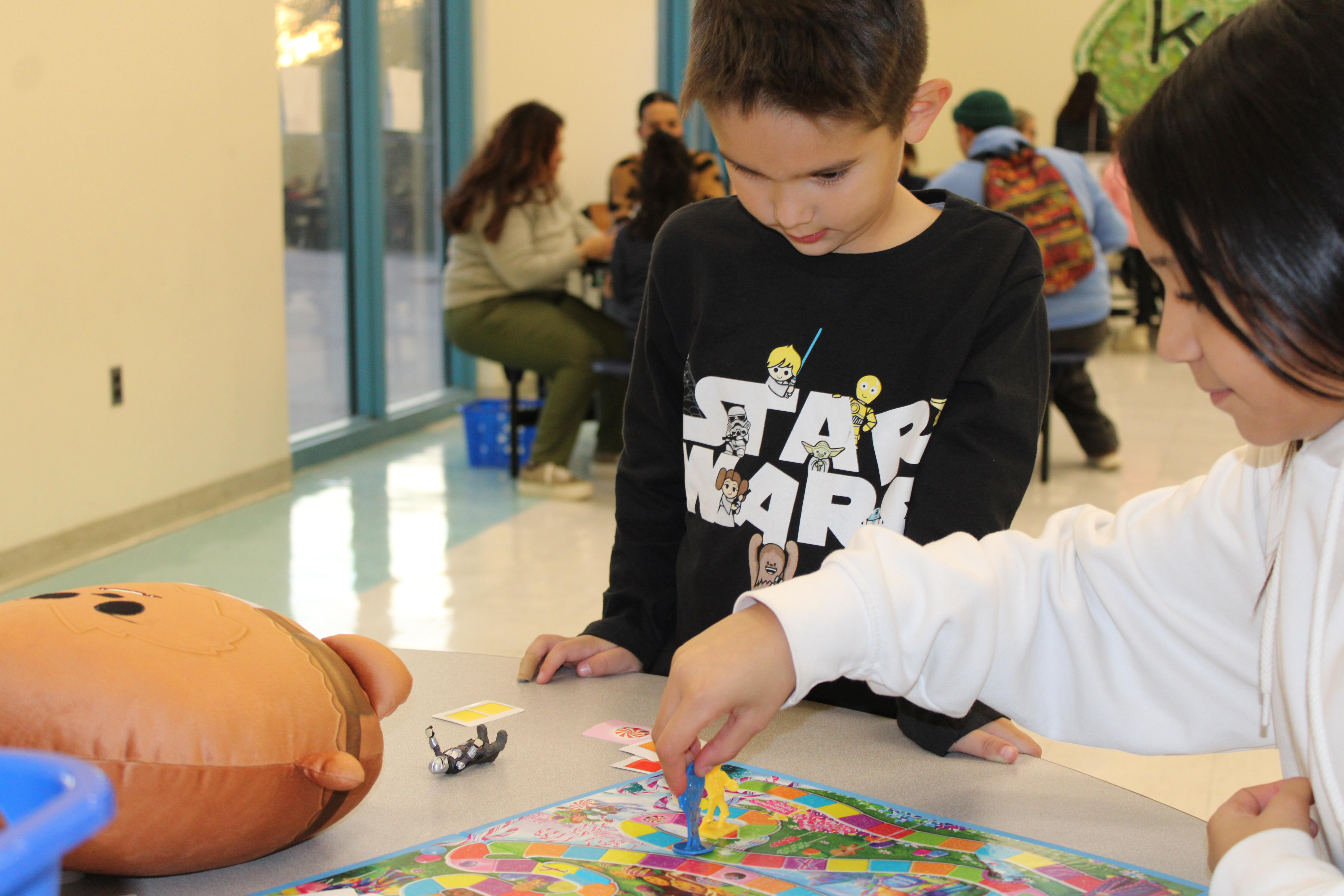 Two students play a game of Candy Land