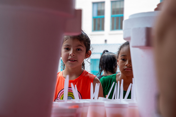 Students line up to get their eegees cups