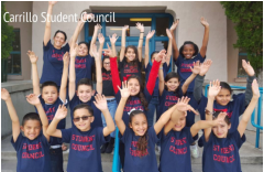 students raising hands